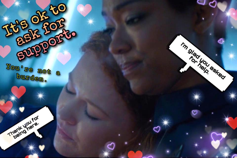 The meme features a screenshot of a character from the TV show "Doctor Who" (Rose Tyler, played by Billie Piper) crying and being comforted by the Doctor. The text "It's okay to not be okay" appears in the top left corner, and the phrase "It's okay" is repeated in a smaller font at the bottom of the image. The overall tone of the meme is one of support and acceptance, encouraging the viewer to acknowledge and validate their own emotions.